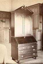 Tall desk with cabinet, slanted lid, and drawers